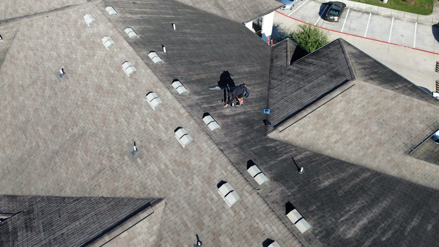 Wide view of multifamily roof repair